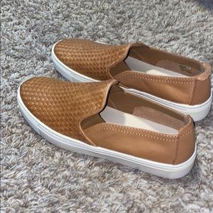 Tan woven slip on shoes